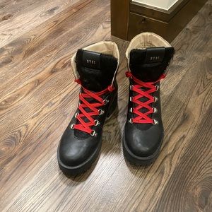 Black leather combat boots